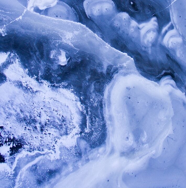 a close up view of ice and water